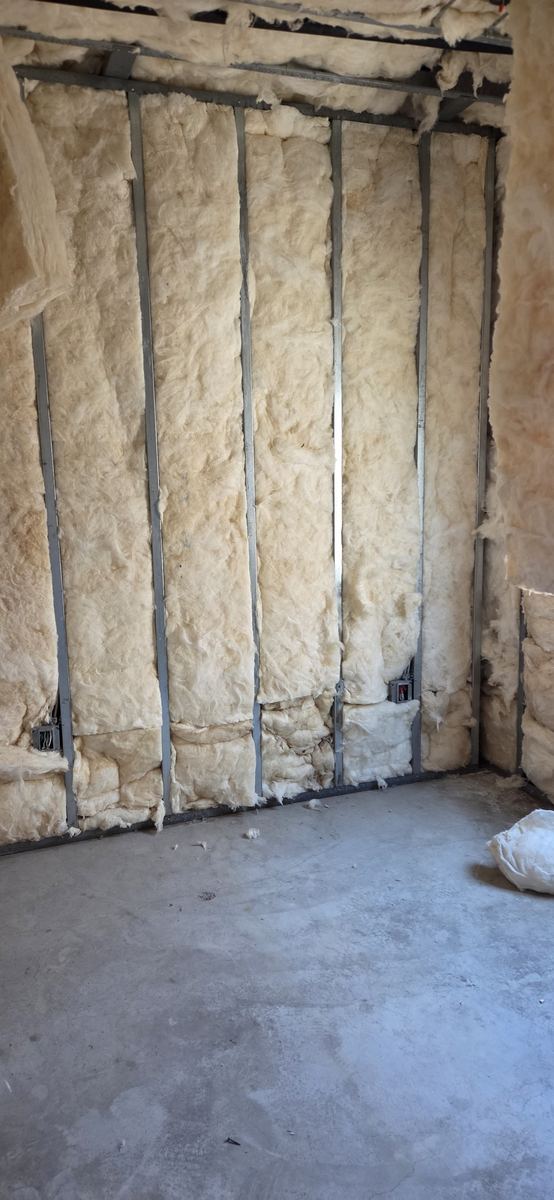 Ceiling bays insulated ahead of boarding.