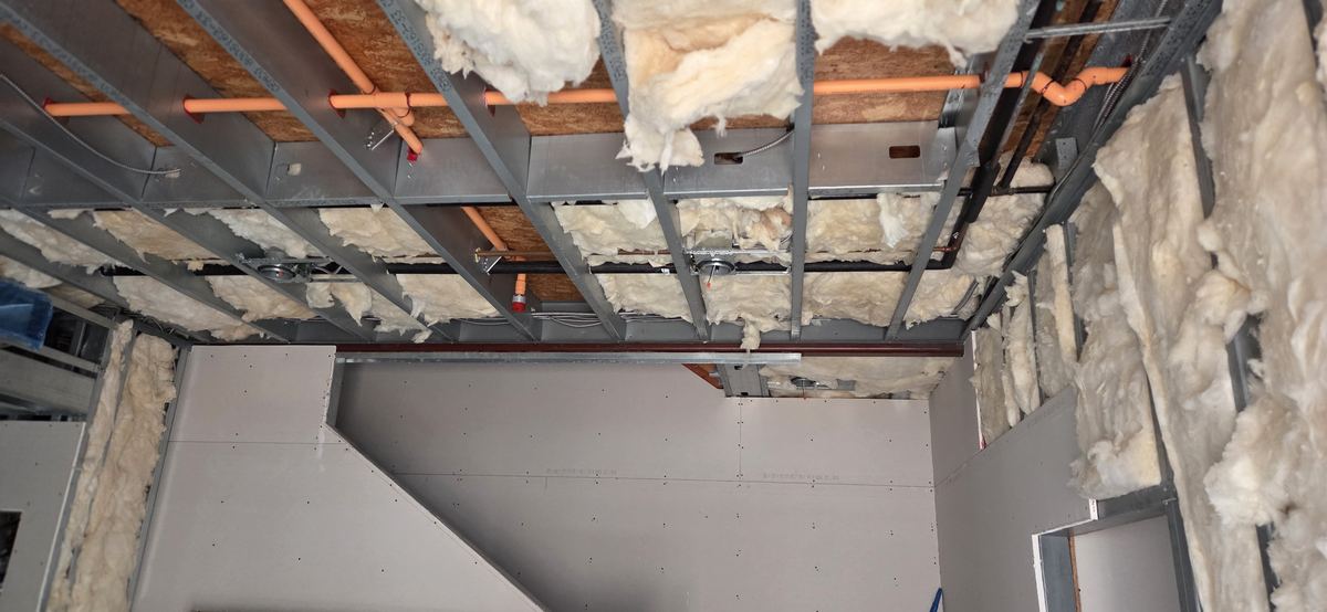 Soffit framed and boarded into the ceiling plane.
